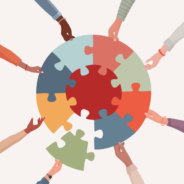 People working together to build a puzzle.